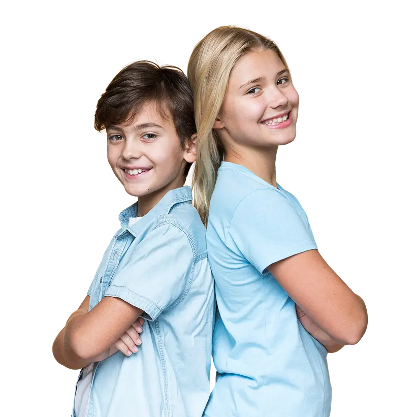 Two children smiling back-to-back